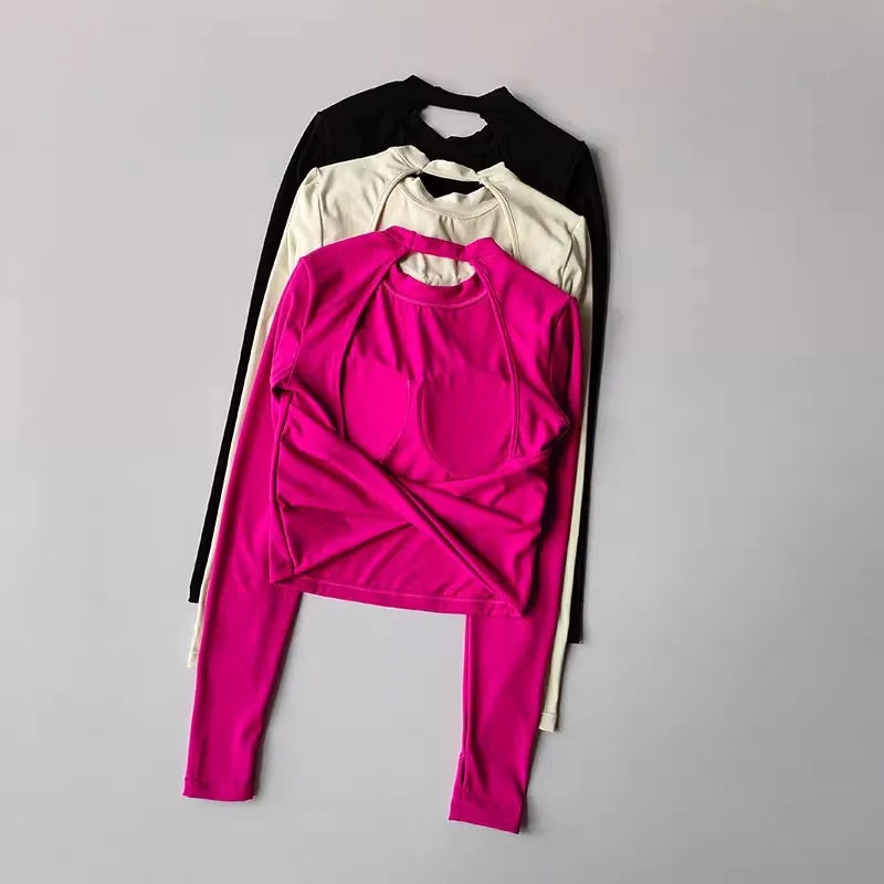 Backless long-sleeve crop top for yoga/fitness.