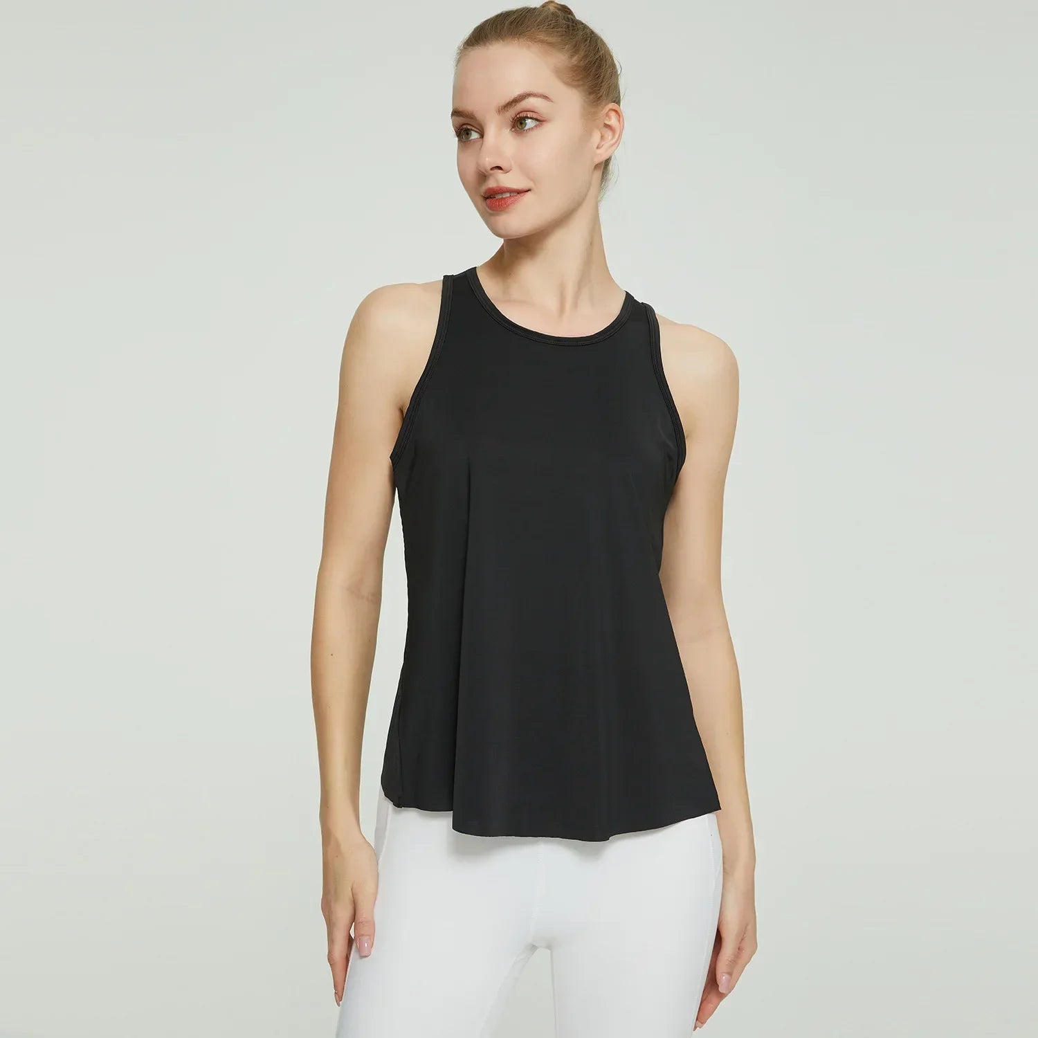 Racerback Tank Top: Quick-dry, breathable shirt for yoga and workouts.