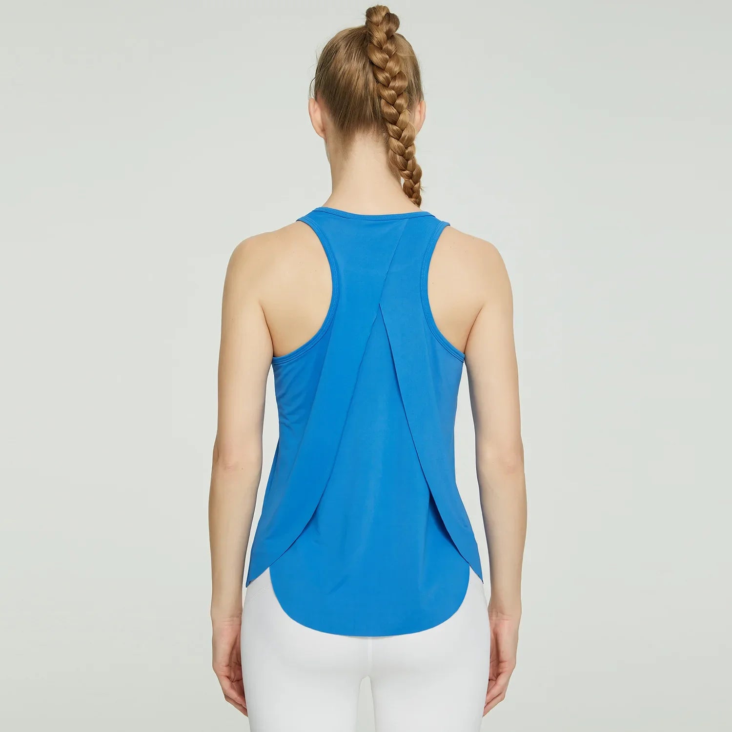 Racerback Tank Top: Quick-dry, breathable shirt for yoga and workouts.