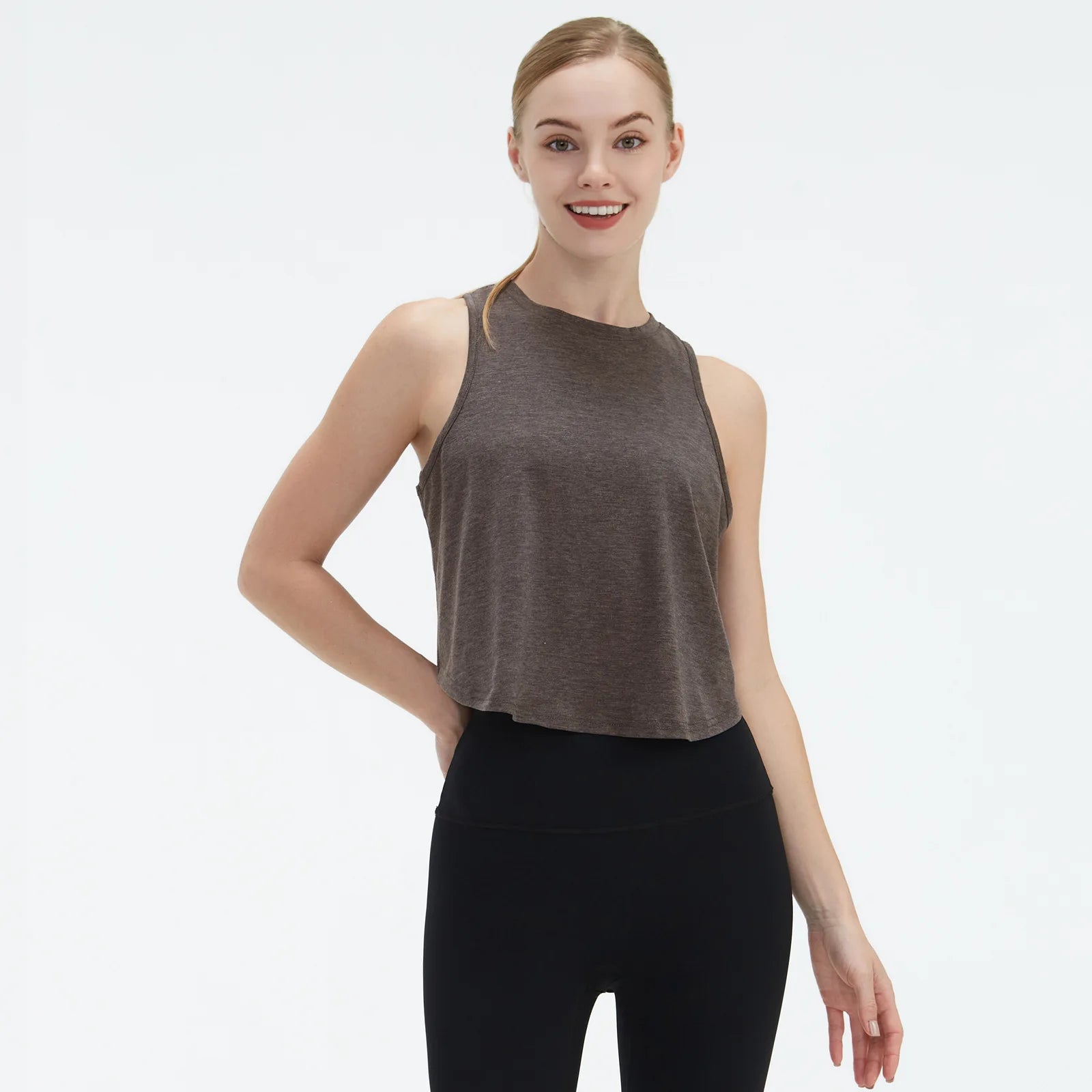  Sleeveless BeFit Yoga and Fitness Tank Top in [ dark grey]. Shows a comfortable, breathable fit perfect for studio stretching and running.