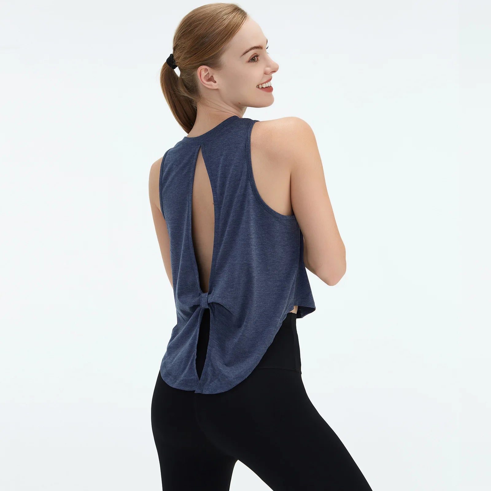  Sleeveless BeFit Yoga and Fitness Tank Top in [Blue]. Shows a comfortable, breathable fit perfect for studio stretching and running.