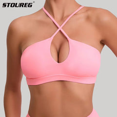 STOUREG cross back padded sports bra for women, breathable gym and yoga wear.
