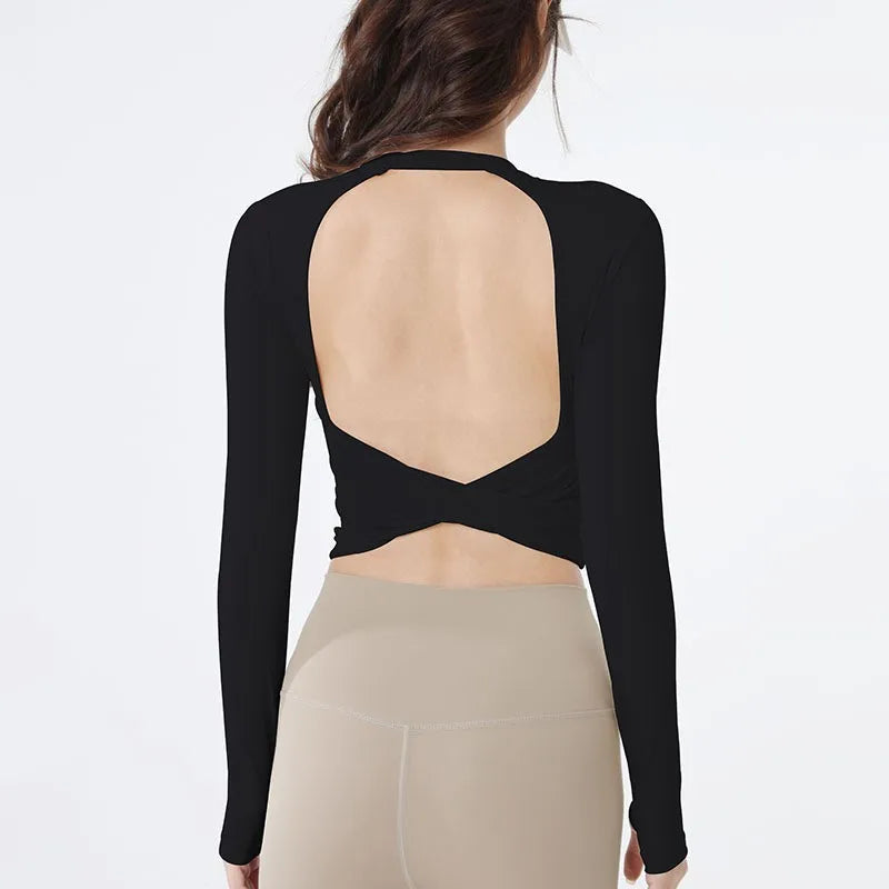 Backless long-sleeve crop top for yoga/fitness.