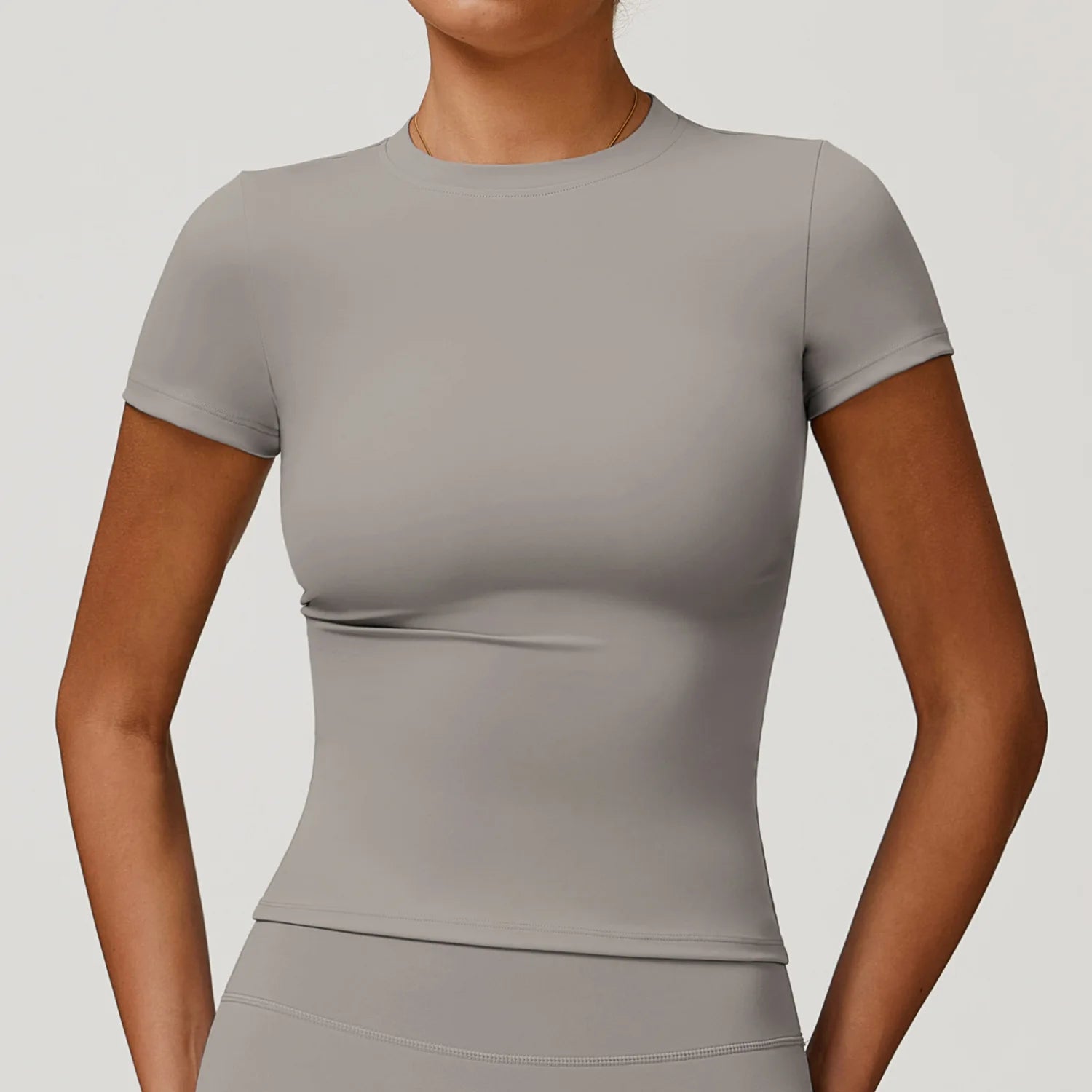 Women’s Slim Fit Sports Top – Breathable, Flexible & Workout Ready