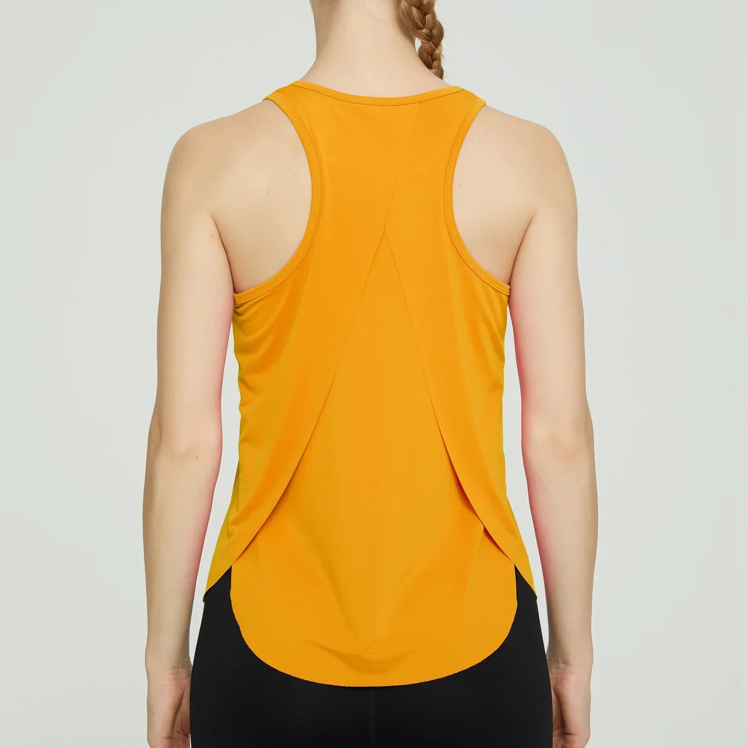 Racerback Tank Top: Quick-dry, breathable shirt for yoga and workouts.