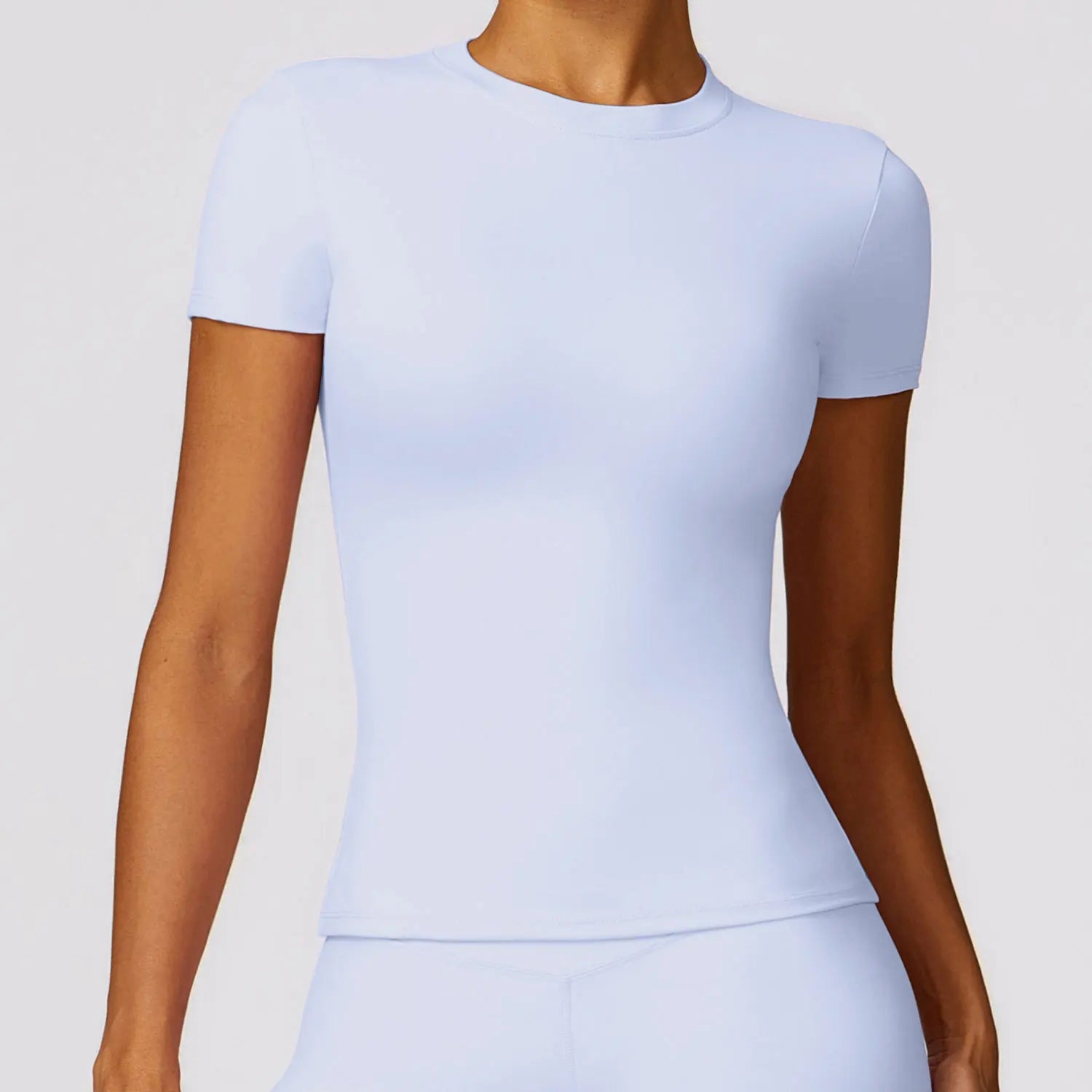 Women’s Slim Fit Sports Top – Breathable, Flexible & Workout Ready