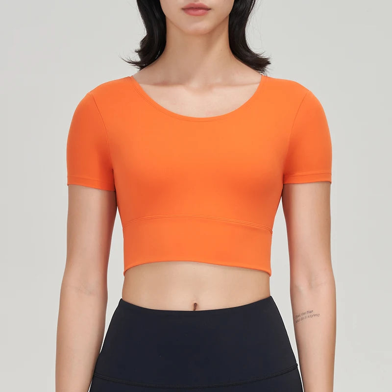 Women’s Gym Crop Top – breathable, elastic, removable pads.