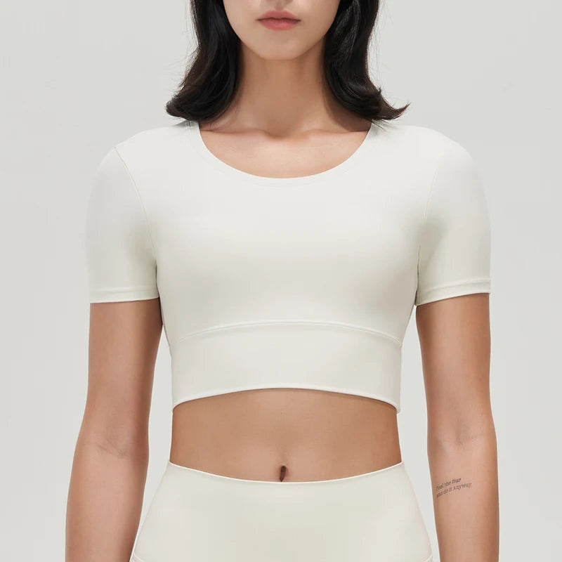 Women's nylon gym crop top with removable chest pads, breathable and elastic yoga sport shirt in 6 colors.