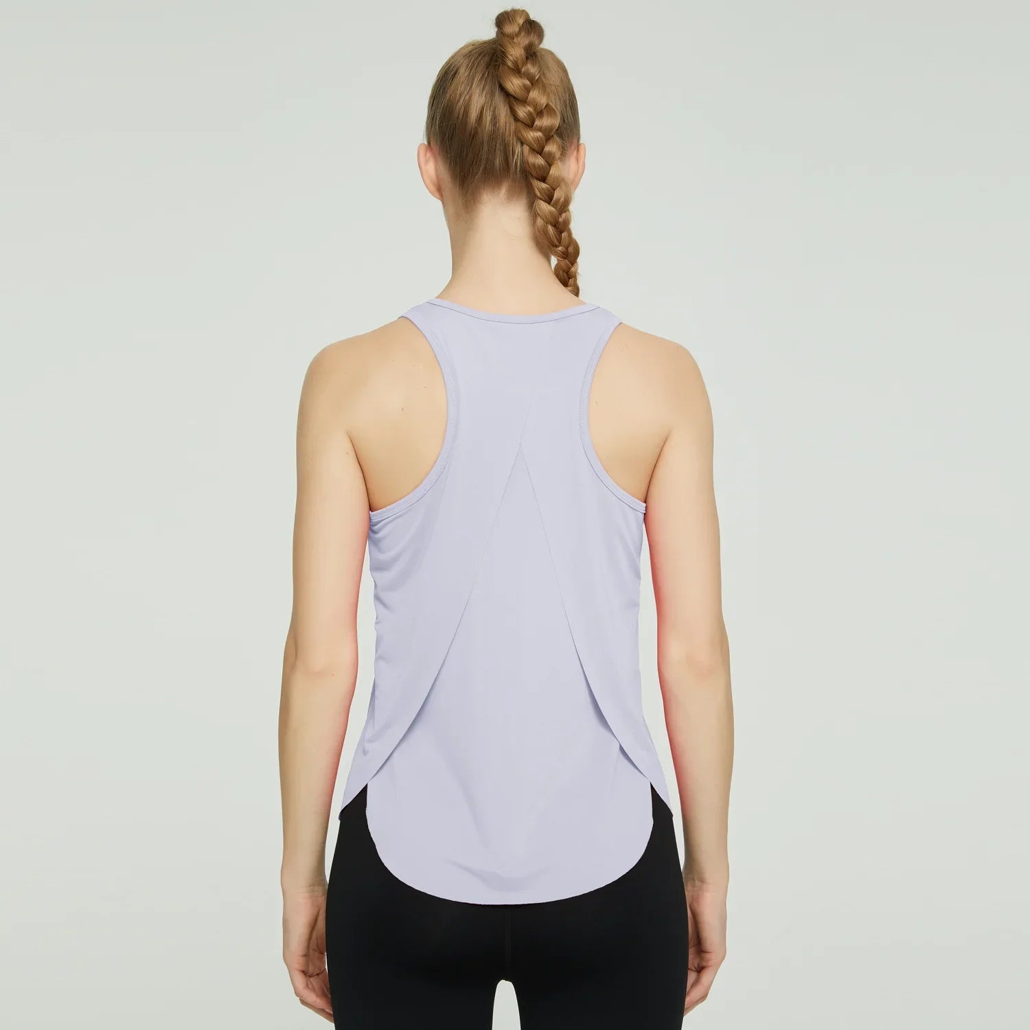 Racerback Tank Top: Quick-dry, breathable shirt for yoga and workouts.