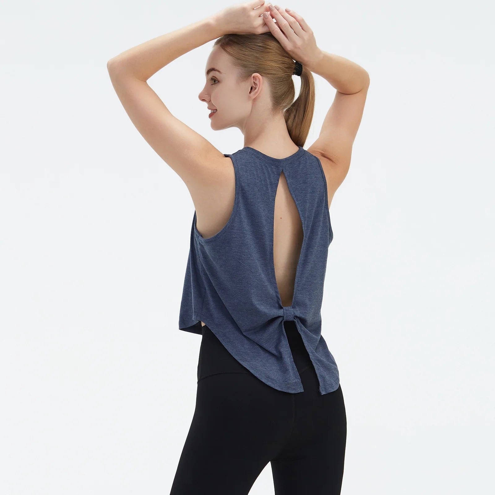  Sleeveless BeFit Yoga and Fitness Tank Top in [Blue]. Shows a comfortable, breathable fit perfect for studio stretching and running.