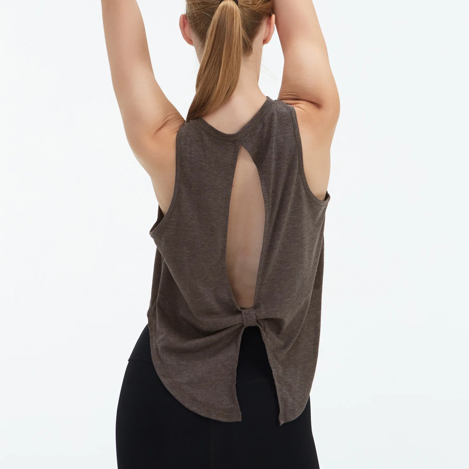  Sleeveless BeFit Yoga and Fitness Tank Top in [ dark grey]. Shows a comfortable, breathable fit perfect for studio stretching and running.