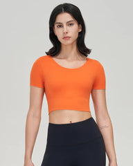 Women’s Gym Crop Top – breathable, elastic, removable pads.